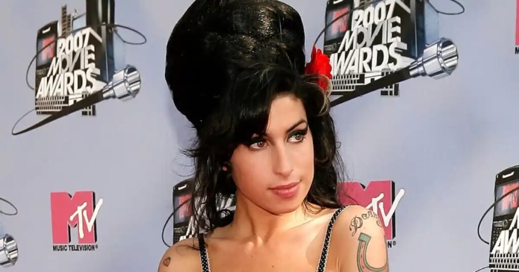 Amy Winehouse’s Dad Ordered to Pay Over $1M to Her Friends