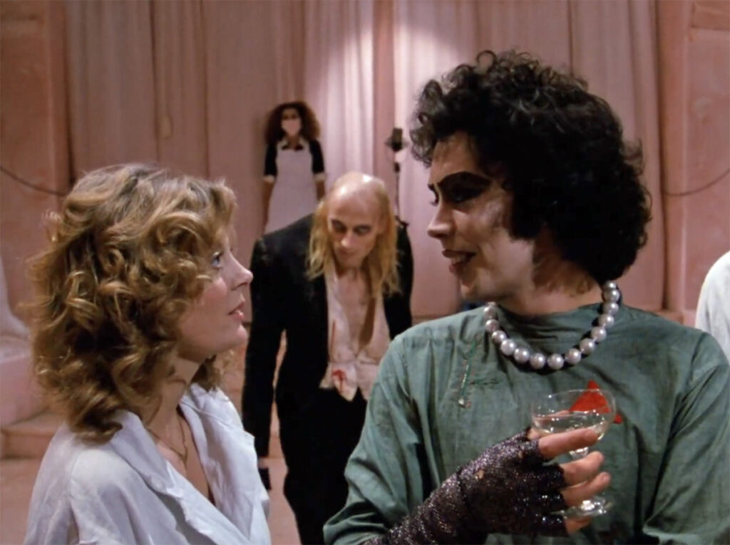 Susan Sarandon & More Of Tim Curry’s Co-Stars React To His Death: ‘What I Loved About Him Most Was His Heart’